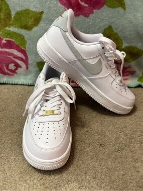 Nike White Air Force 1’s Sneakers with Light Gray Swoosh and Gold Tag